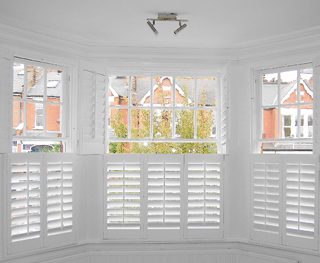 Interior sash window shutters